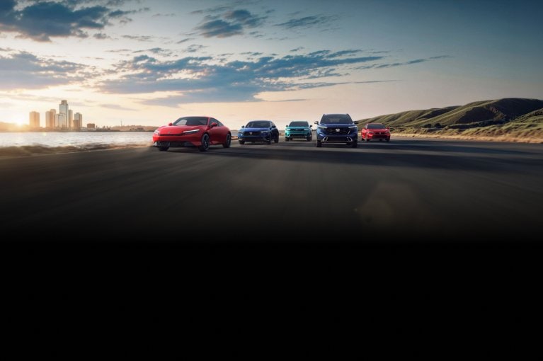 2026 Honda Prelude Hybrid, Civic Sedan, Prologue, Accord, and CR-V front with a city skyline at sunset. 2026 Honda Prelude Hybrid, Civic Sedan, Prologue, Accord, and CR-V front with a city skyline at sunset.