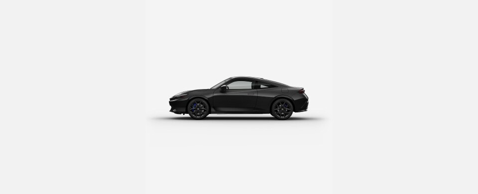 2026 Honda Prelude Hybrid in Crystal Black Pearl profile parked in a clean white studio setting (Exhilarating Hybrid Coupe). 2026 Honda Prelude Hybrid in Crystal Black Pearl profile parked in a clean white studio setting (Exhilarating Hybrid Coupe).