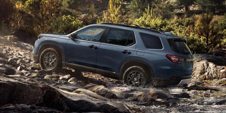 2026 Honda Pilot TrailSport Shown in Smoke Blue Pearl with Honda Genuine Accessories.