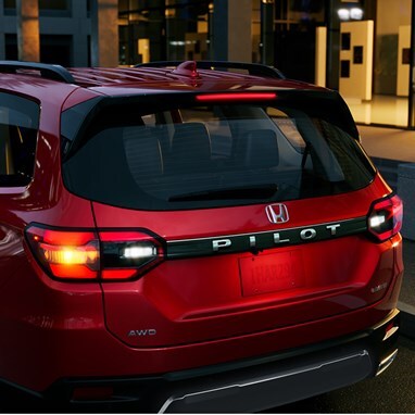 2026 Honda Pilot Elite shown in Radiant Red Metallic II rear view