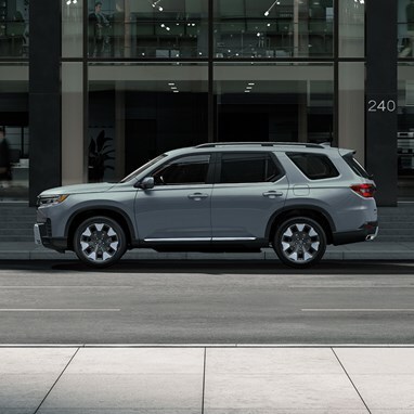 2026 Honda Pilot Elite shown in Sonic Gray Pearl driver side view