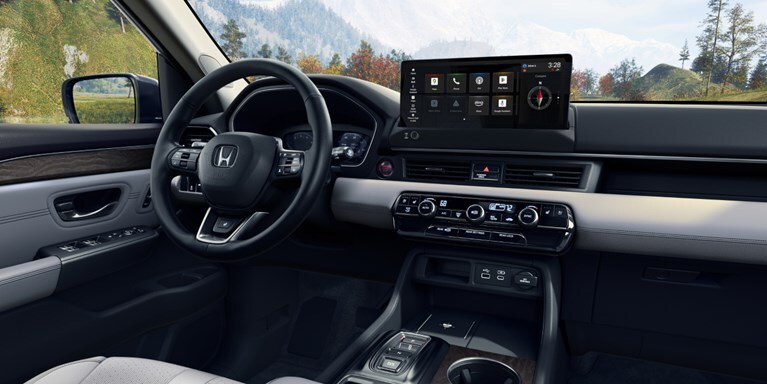 2026 Honda Pilot Elite shown with Gray Leather with the screen