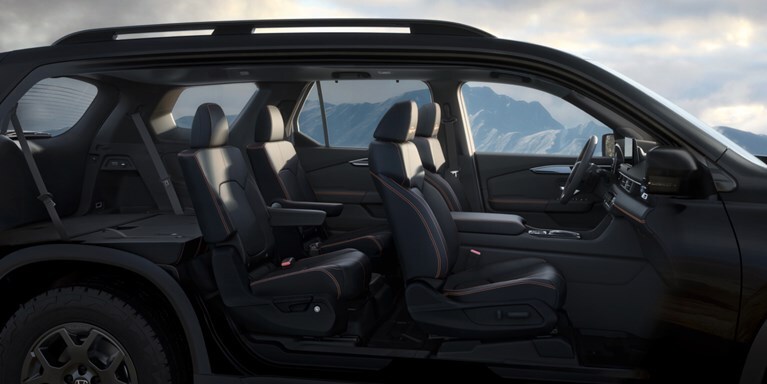 2026 Honda Pilot TrailSport shown in Crystal Black Pearl with Black Durable Synthetic Leather.