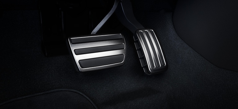 2026 Honda Civic Hatchback close up of the sport pedals with metallic finish (Compact Hatchback).