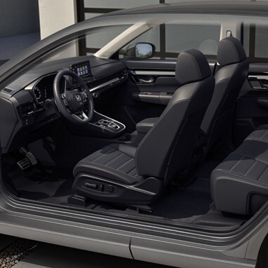 Driver's side buck of interior of e:FCEV in Meteorite Gray Metallic with Black interior showing 70/30 rear seat configuration.